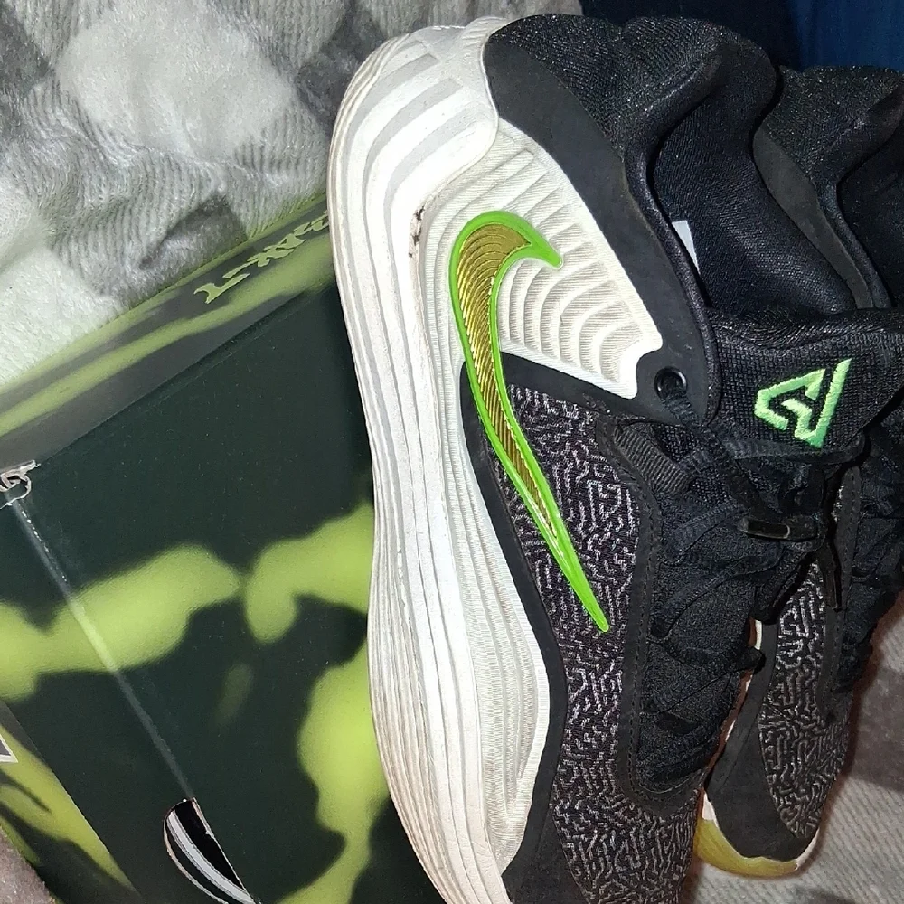 Nike Black Sneakers with Bright Green Swoosh and White Midsole